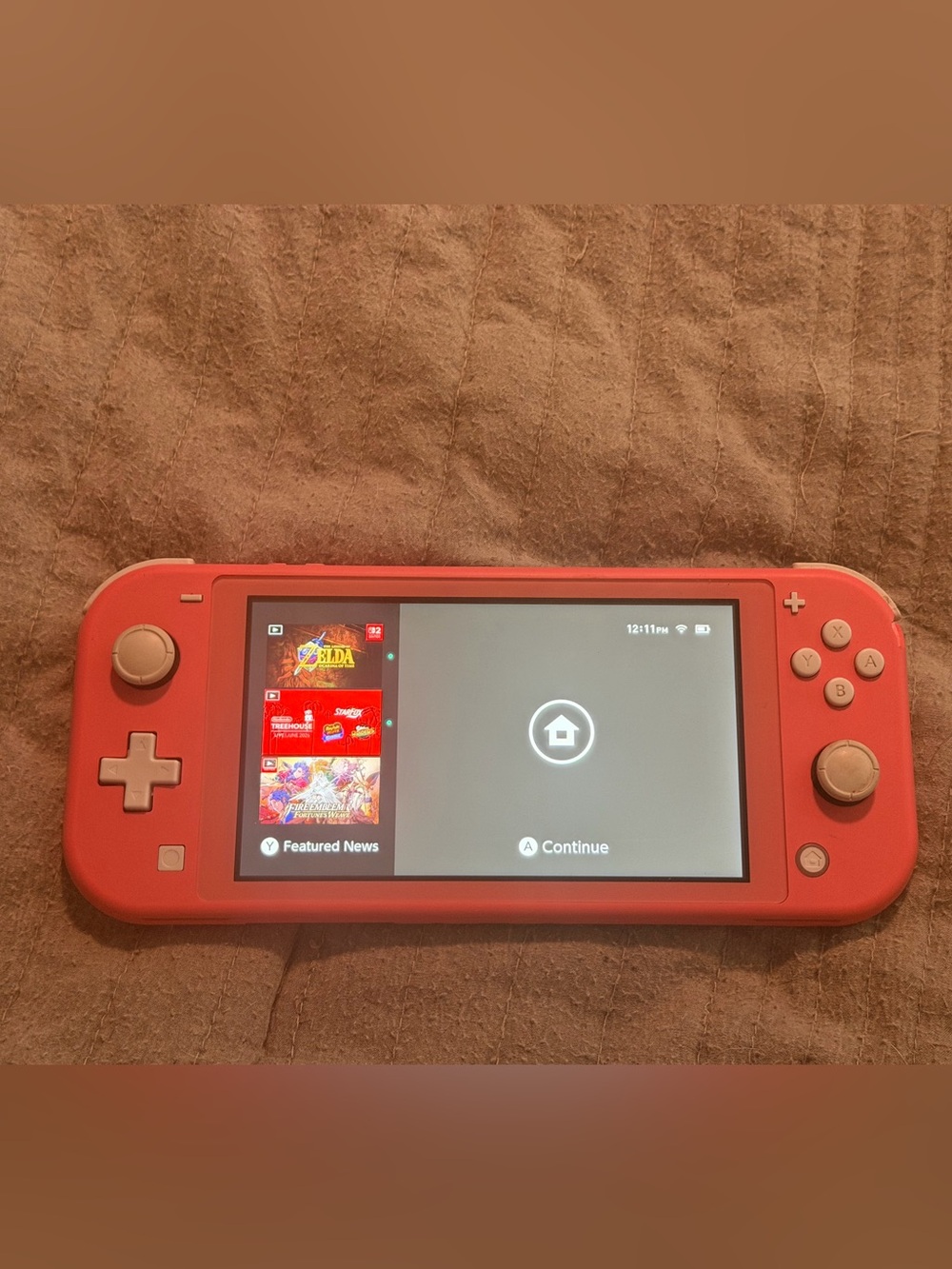 Nintendo Switch Lite Coral Pink Handheld Console with Minecraft game